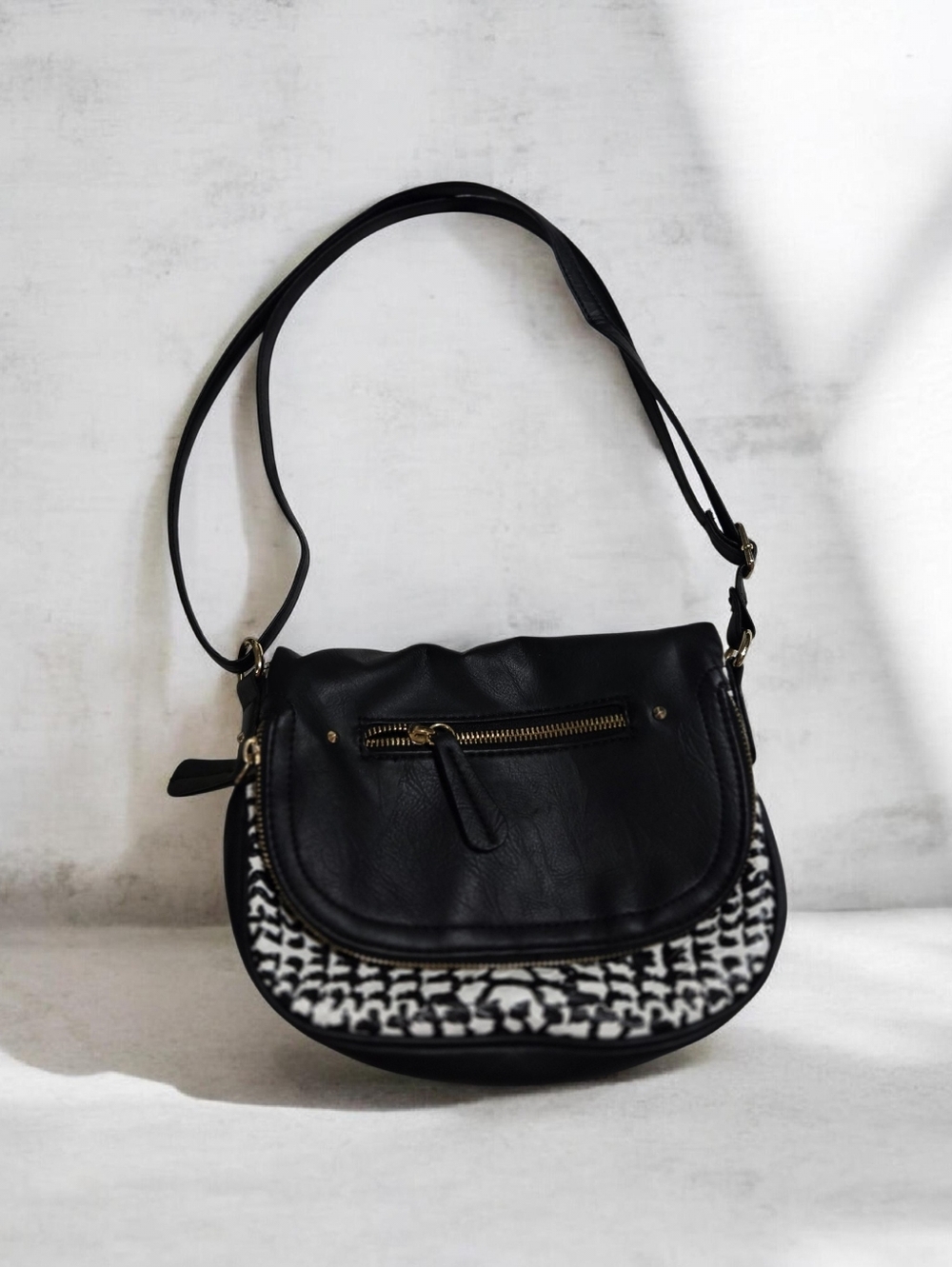 Black Crossbody Purse with Patterned Accent.